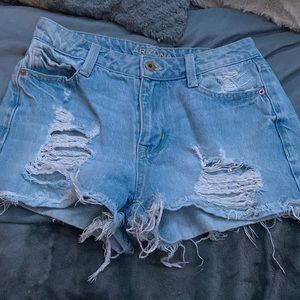 Light blue ripped jean shorts